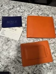 Royce Orange Bifold Men's Wallet With Credit Card Holder, Solid Logo Accent. Fixed Price $95.00.