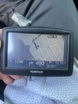 Tomtom Gps Navigation System N14644 W/ Car Charger Mount Working Bundle. Fixed Price $5.00.