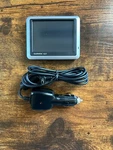Garmin Nuvi 1200 Series Navigation System Bundle W Car Adapter Tested. Fixed Price $7.14.