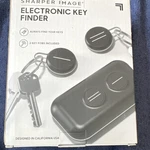 Sharper Image Wireless Remote Key Finder Black 2 Fobs Alarm Cradle. Fixed Price $15.00.