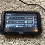 Magellan Roadmate 5220-LM Automotive Mountable Gps With Charger. Fixed Price $26.66.