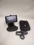 Garmin Nuvi Navigator Model 10R-024462 Bundle With Car Charger, Case, & Cradle. Fixed Price $42.08.